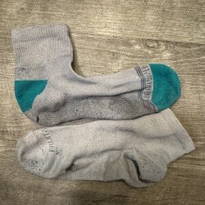 Well worn mismatched womens gym socks